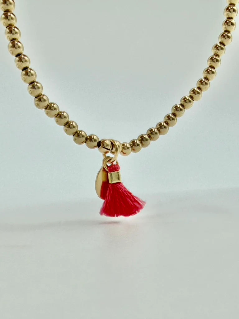 DANE JEWELLERY - PETITE BURGUNDY TASSEL BRACELET - GOLD – The Luxe Edit